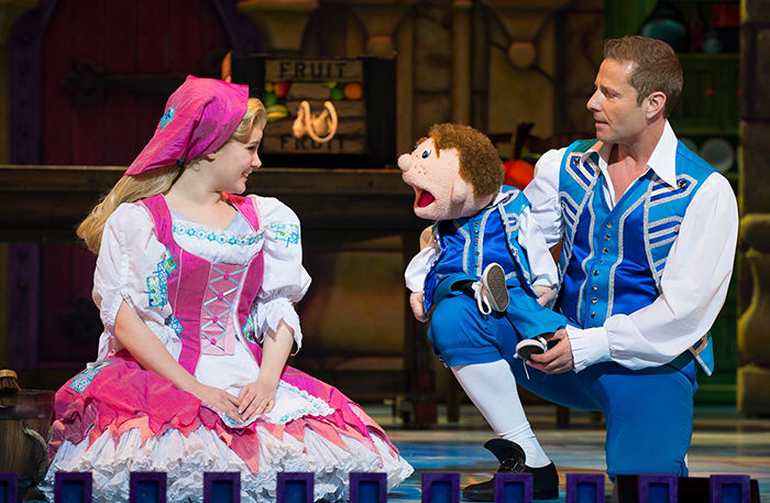 Cinderella and Buttons (played by ventriloquist Paul Zerdin and his puppet) in Cinderella at the Palladium pantomime, 2016.