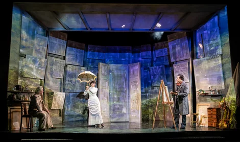 Monet (Jeff Shankley) watches Young Monet (Dean John-Wilson) paint Camille (Brooke Bazarian) A Mirrored Monet