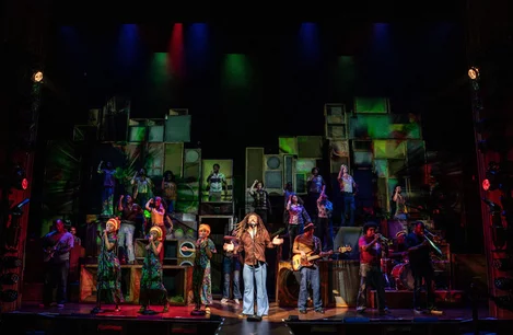 Arinzé Kene (Bob Marley) and the company of Get Up, Stand Up! at the Lyric Theatre