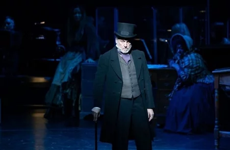 Brian Conley as Ebenezer Scrooge in A Christmas Carol at the Dominion Theatre