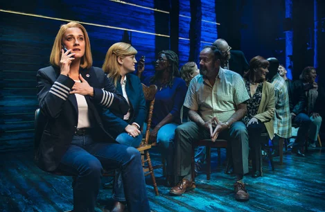 Alice Fearn as Beverley Bass and the cast of Come From Away