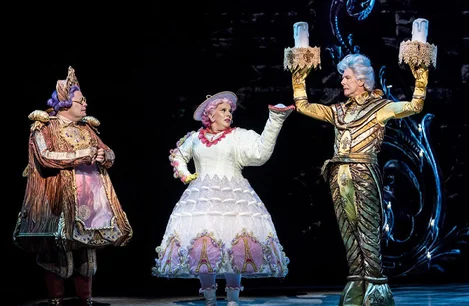 Nigel Richards (Cogsworth), Sam Bailey (Mrs Potts) and Gavin Lee (Lumiere) in Beauty and the Beast
