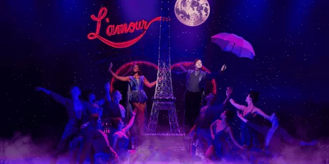 The cast with the Eiffel Tower in Moulin Rouge! The Musical