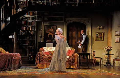 Emma Naomi (Elvira) and Geoffrey Streatfeild (Charles) in Blithe Spirit at the Harold Pinter Theattre