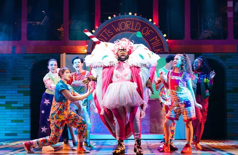 Emmanuel Akwafo as Dame Trott and the cast of Lyric Hammersmith's Jack and the Beanstalk