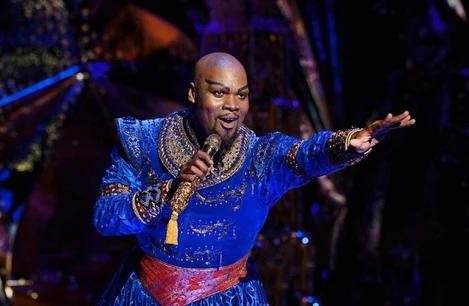 Michael James Scott (Genie) in Aladdin on Broadway