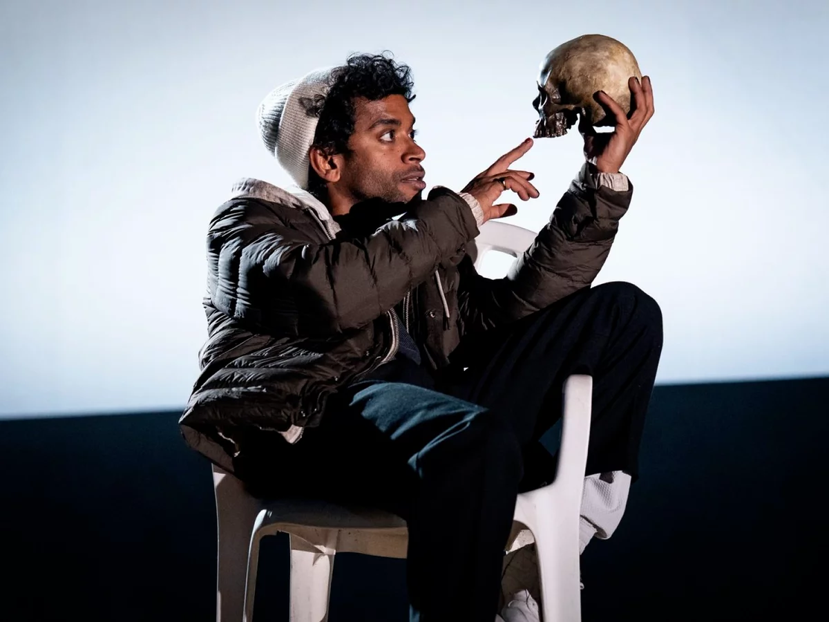 Hamlet (Hiran Abeysekera) and Yorick in Hamlet