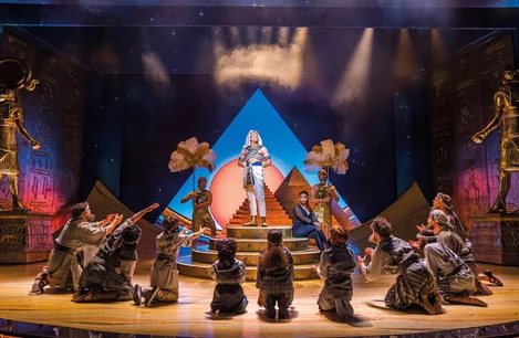 Jac Yarrow as Joseph and ensemble in Joseph and the Amazing Technicolor Dreamcoat at the London Palladium