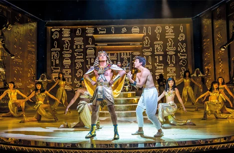 Jason Donovan as Pharaoh and Jac Yarrow as Joseph in Joseph and the Amazing Technicolor Dreamcoat at the London Palladium