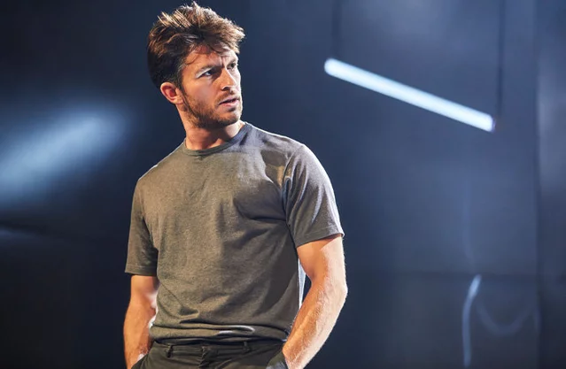 Jonathan Bailey as John in Cock at the Ambassadors Theatre