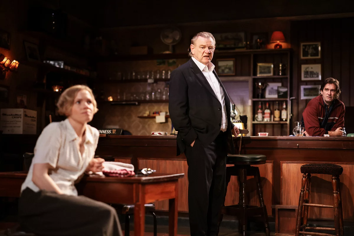Kate Phillips, Brendan Gleeson, and Owen McDonnell star in The Weir at the Harold Pinter Theatre.