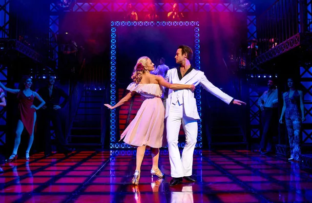 Stephanie (Olivia Fines) and Tony (Richard Winsor) dance together in Saturday Night Fever at the Peacock Theatre