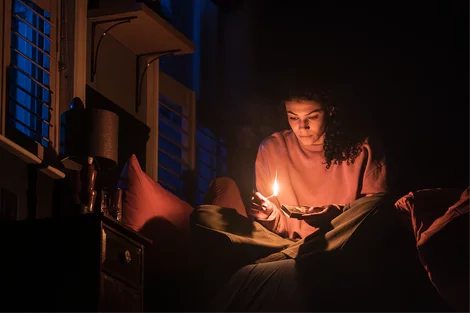 Melissa James stars as Lou in Paranormal Activity