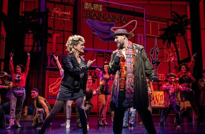 Rachael Wooding as Kit de Luca and Bob Harms as Happy Man in Pretty Woman the Musical at the Piccadilly Theatre