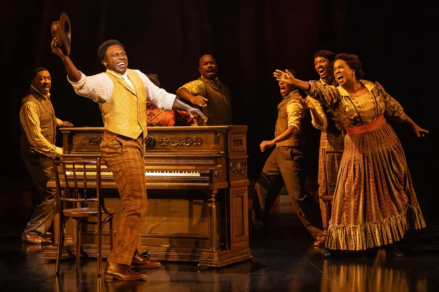 Joshua Henry as Coalhouse Walker Jr. and the cast of Ragtime