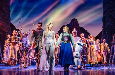 Samantha Barks (Elsa), Emily Lane (Anna) and the company of Frozen the Musical