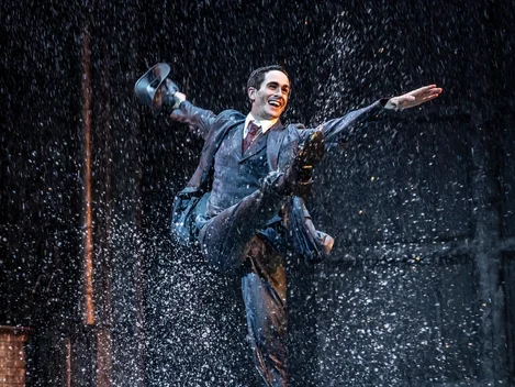 Grant Almirall stars as Don Lockwood in Singin' In The Rain