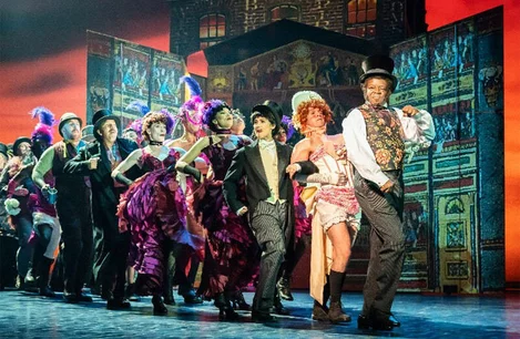 Stephen K Amos (Alfred Doolittle) and the company of My Fair Lady