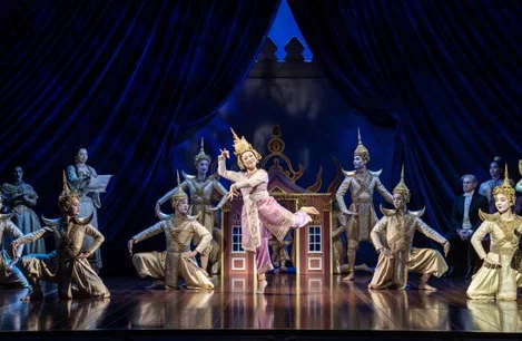 The company of The King and I at the Dominion Theatre