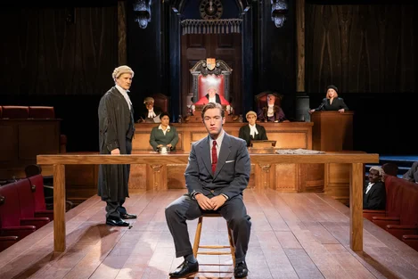 Leonard Vole (Matthew McGivern) and the cast of Witness for the Prosecution