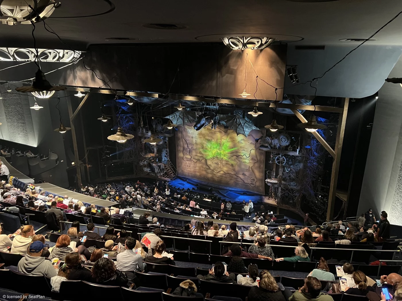 A seat view photo for Wicked Broadway It shows the stage at the Gershwin theatre, with the safety curtain down. as seen from the Mezzanine. 
