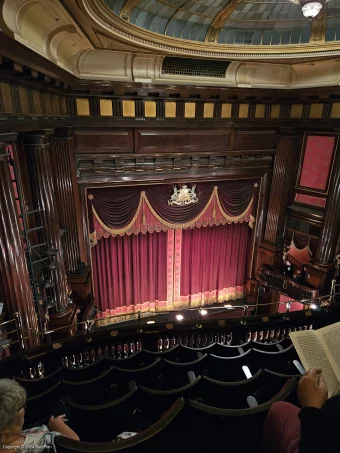 St Martin's Theatre Upper Circle F1 view from seat photo